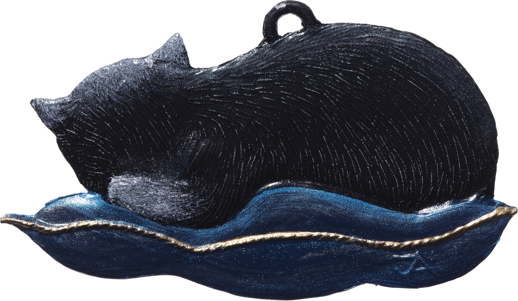 Katze auf Kissen